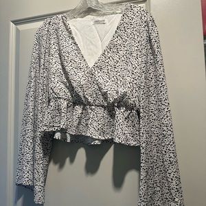 Vestique peplum top size S